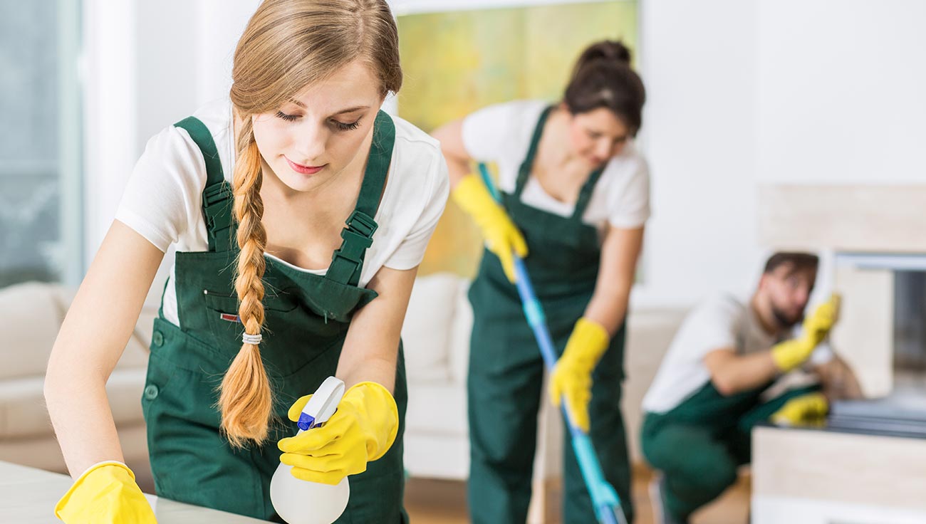 Woman cleaning Professional cleaner using eco-friendly products in a Hertfordshire home